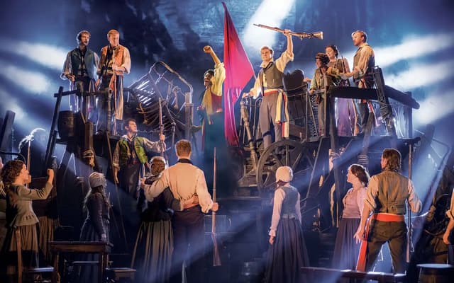 The company of Les Misérables at the Sondheim Theatre, London