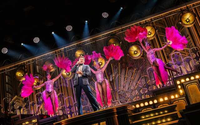 The cast of Just in Time in a nightclub number at Circle in the Square Theatre