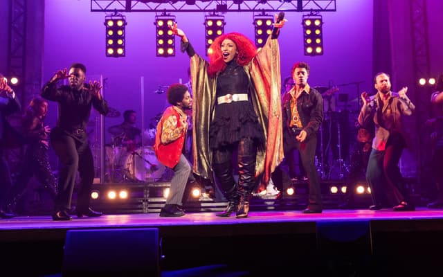 Alexandra Burke takes a bow at the press night curtain call of I'm Every Woman: The Chaka Khan Musical. Photo by Piers Allardyce