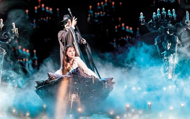 The Phantom and Christine in the iconic boat scene from The Phantom of the Opera at His Majesty's Theatre