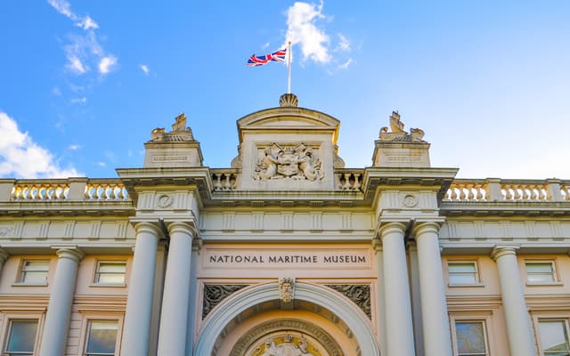 National Maritime Museum entrance with British flag, Greenwich.