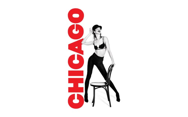 The sharp-suited staging of a Broadway musical under theatre lights