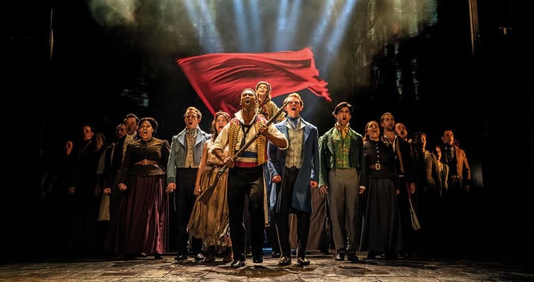 The company of Les Misérables on stage