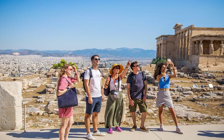 Guided tour group in front of the Parthenon on the Acropolis of Athens