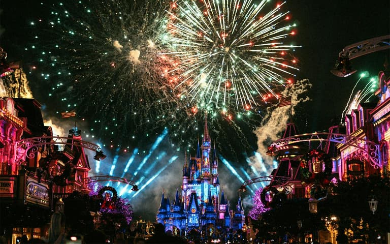 Fireworks bursting over Cinderella Castle at Magic Kingdom
