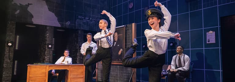 A high-kicking moment in Operation Mincemeat at the Golden Theatre