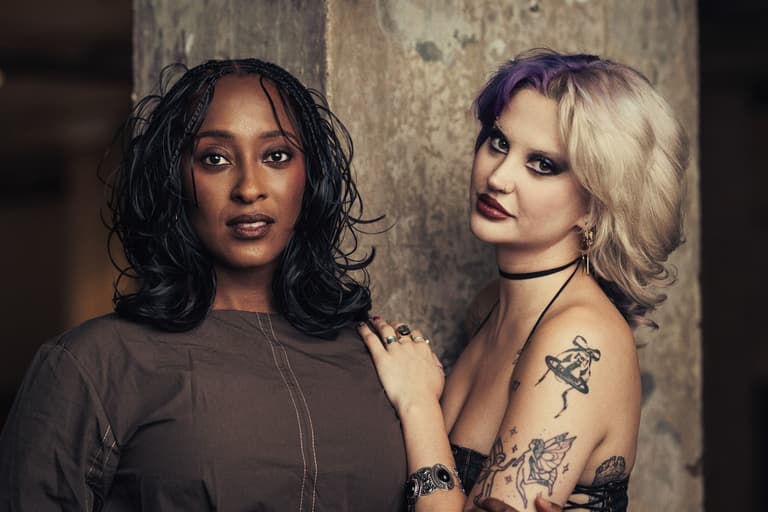 Danielle Fiamanya as Joanne and Lazy Violet as Maureen in RENT