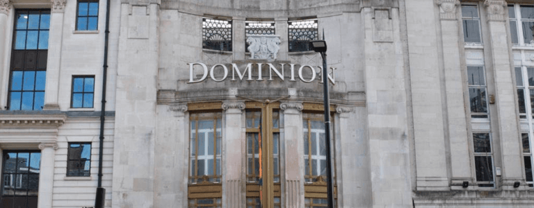 The Art Deco facade and entrance of the Dominion Theatre on Tottenham Court Road, London
