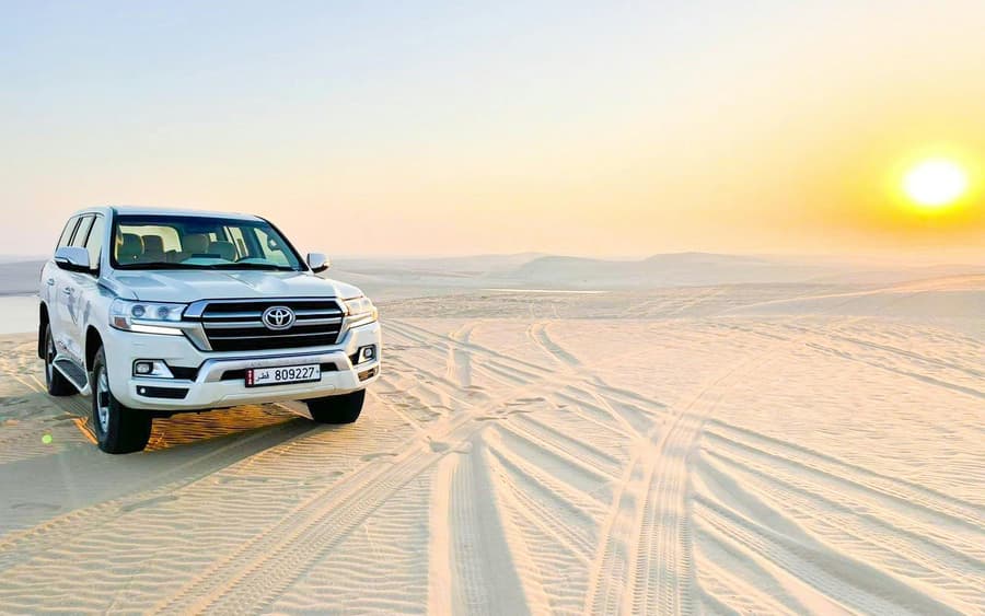 Doha Desert Safari: Dune Bashing, Sandboarding & Inland Sea Visit