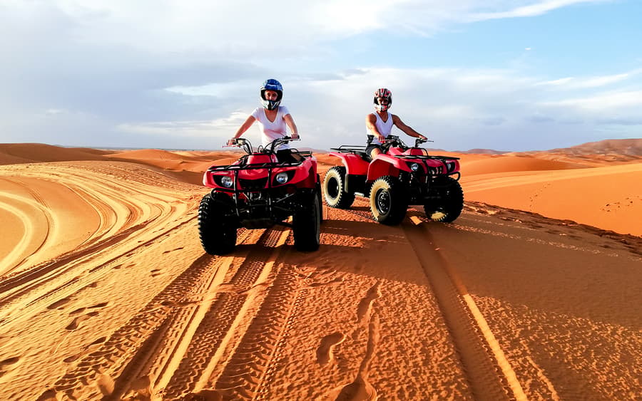 Sunset Desert Tour with Quad Bike, Camel Ride, Dinner Show & Transfers