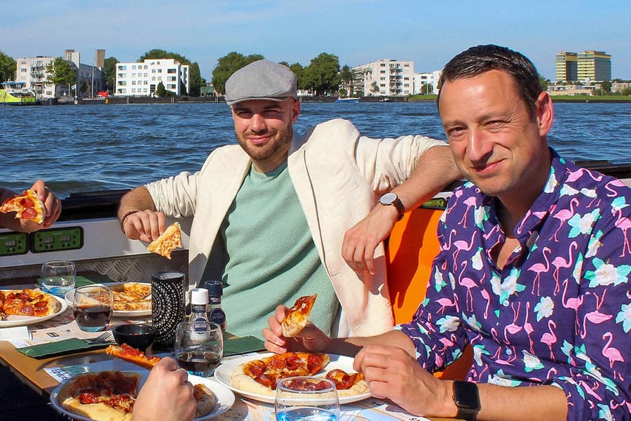 Amsterdam: 90-Min Evening Cruise with Pizza and Drinks, at Lovers Canal Cruises Amsterdam