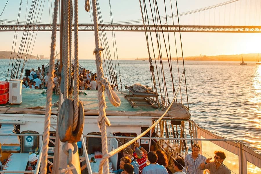 Lisbon: Sunset Boat Party + Live Music + Nightclub Entry, at Lisbon Cruises