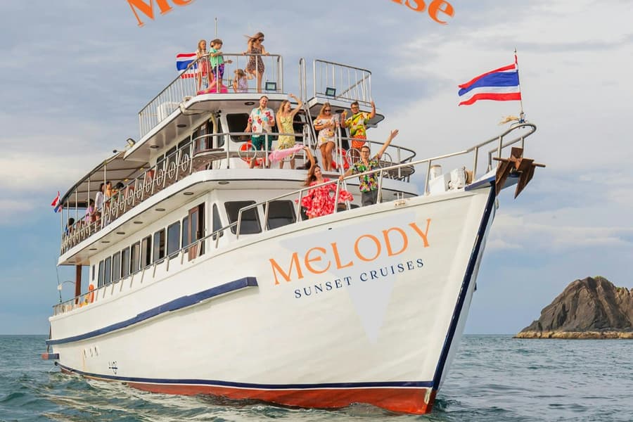 Phuket: Guided Sunset Cruise with Dinner + Drinks + Transfers, at Phuket Cruises & Boat Transfers, Phuket
