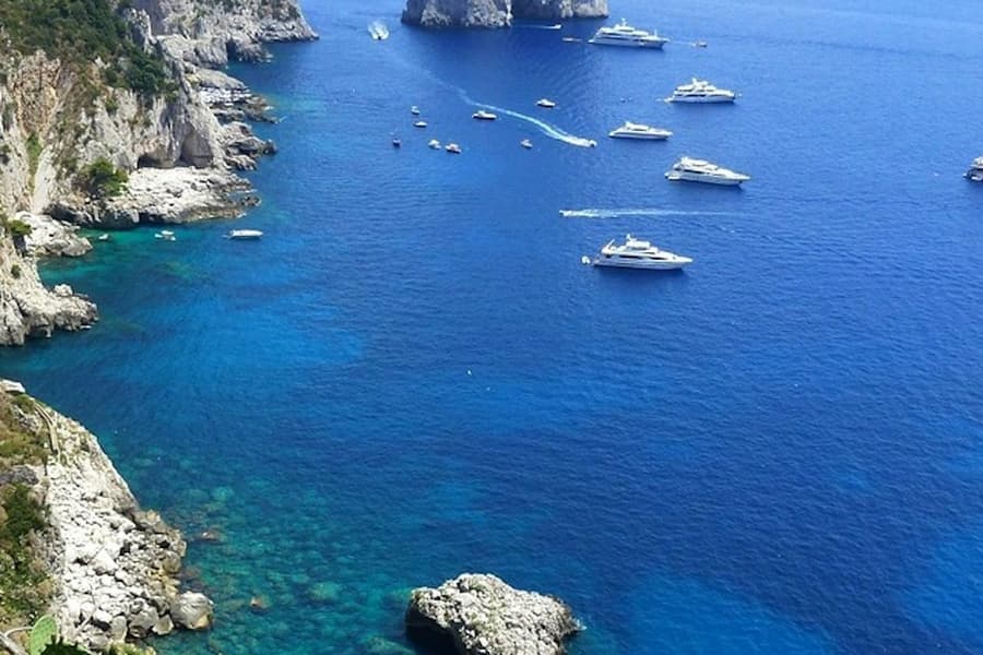 Capri: Boat Tour & Swimming Stop + Roundtrip from Naples, at Capri Day Trips from Naples