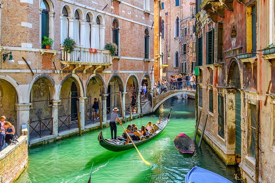 Venice in a Day: St. Mark’s, Doge’s Palace, Murano & Burano with Gondola Ride, at Venezia