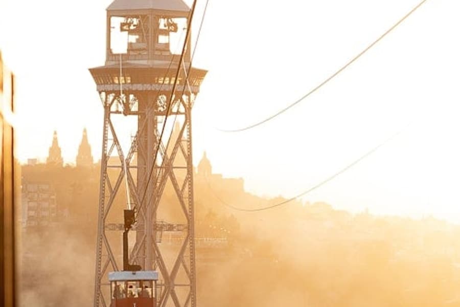 Barcelona: Guided E-bike Tour + Cable Car Ride + Sailing Experience, at Barcelona Boat Trips