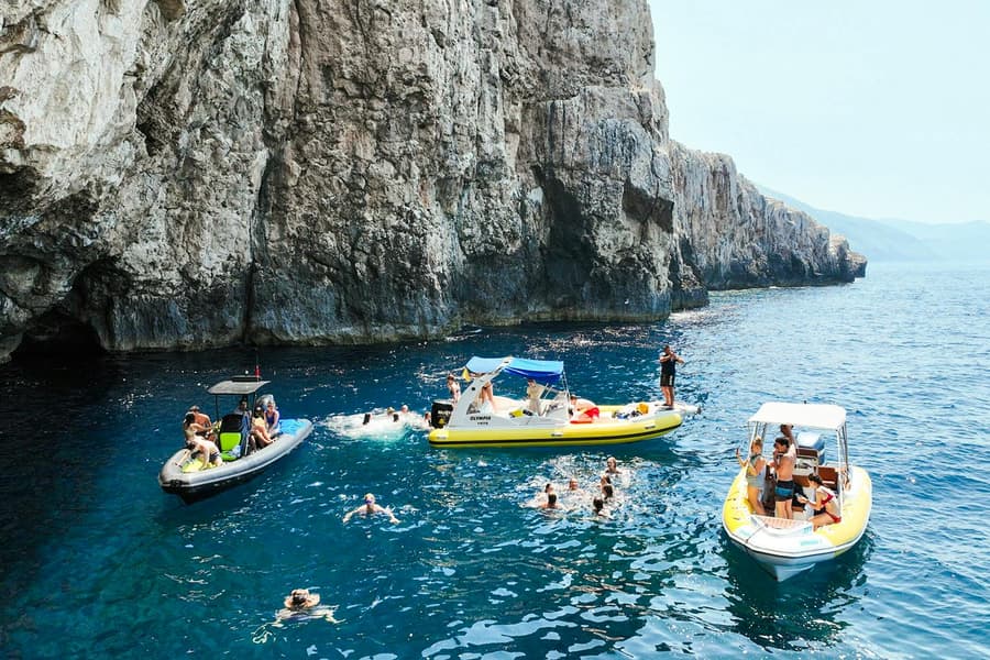 From Vlore: Unknown Escape Party Boat Cruise with Drinks, Music & Secret Swim Stops, Vlore