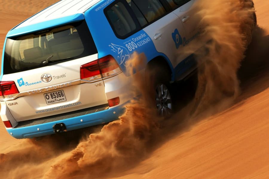 Morning Desert Safari: Dune Bashing, Sandboarding and Camel Rides, at Dubai Desert Safari