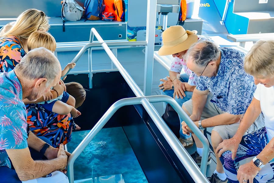 From Airlie Beach: Whitsundays Glass-Bottom Boat Tour, at Pioneer Adventures, Whitsundays