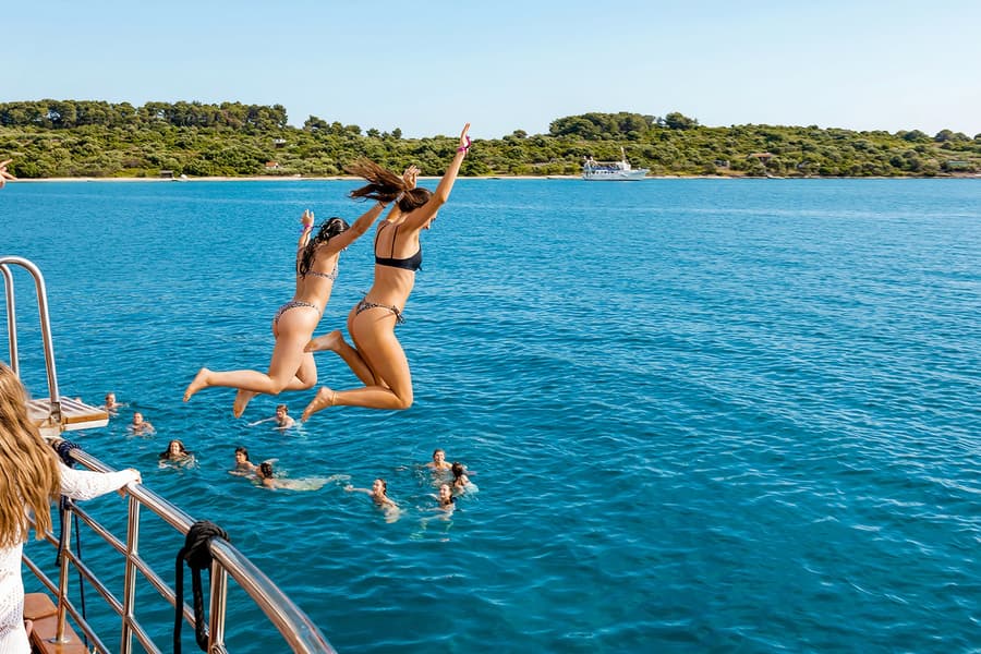 From Split: Blue Lagoon Boat Party with DJs, Swim, Shots & AfterParty, Split