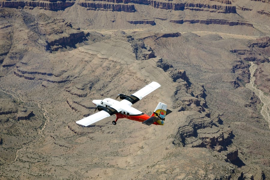 70- min Las Vegas to Grand Canyon West Airplane Tour with Helicopter Canyon Floor Landing & Pontoon Boat Ride, Las Vegas