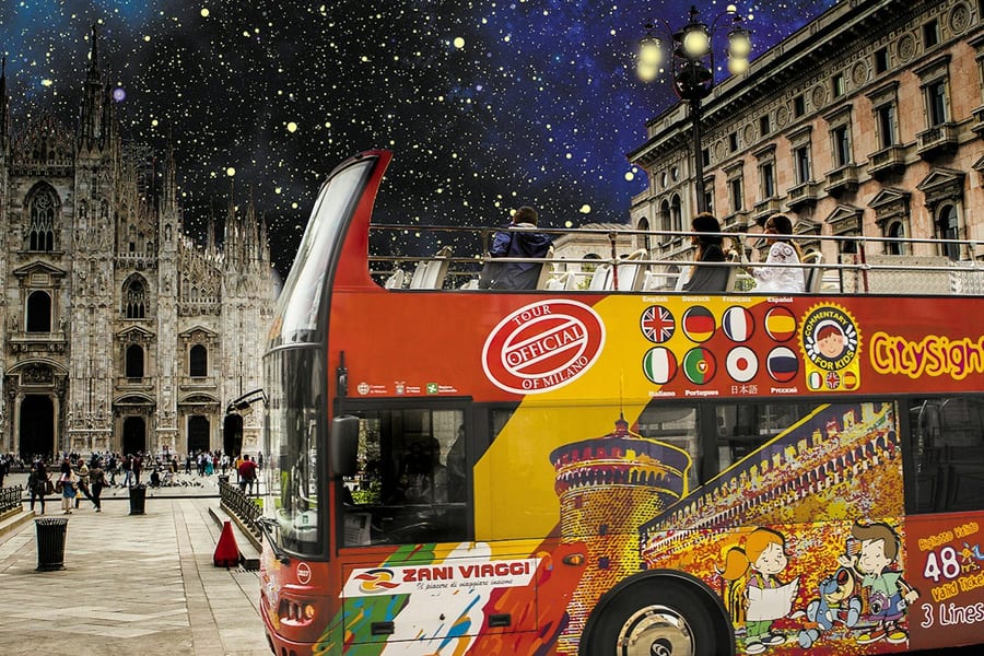 Milan: Open-Top Bus Night Tour + Audio Guide, at Milan Hop-On Hop-Off Tours