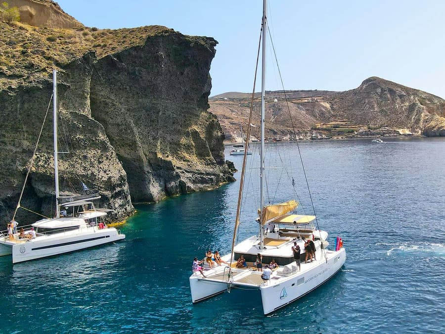 Santorini Luxury Catamaran Cruise with Meal, Drinks & Transfers