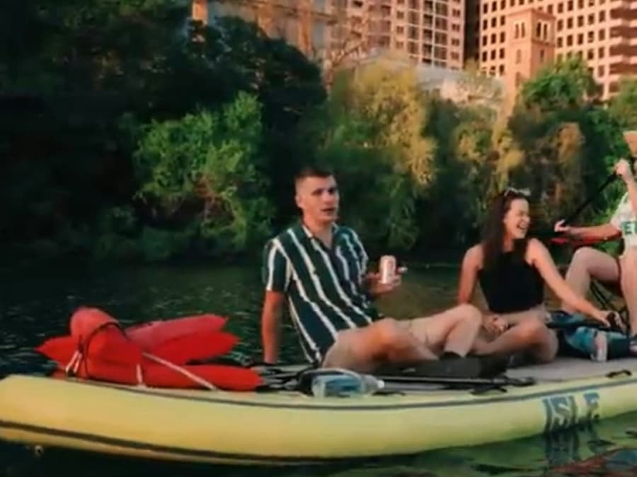Giant Paddleboarding at Sunset with Bats