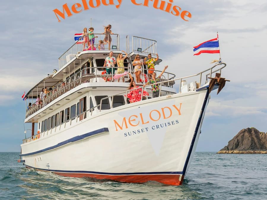 Phuket: Guided Sunset Cruise with Dinner + Drinks + Transfers