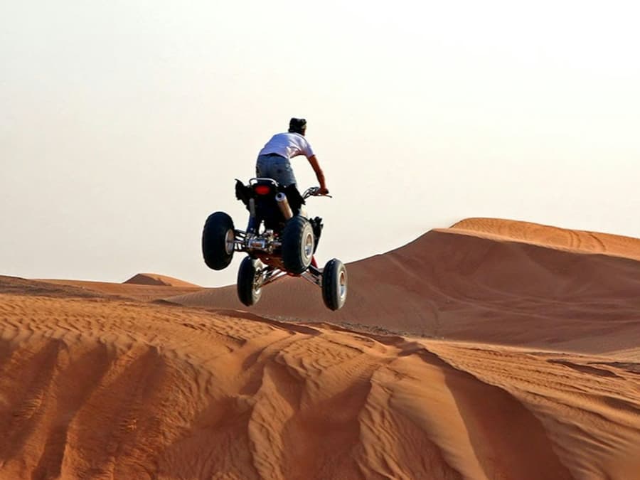 Morning Desert Safari: Quad Bike Experience, Sandboarding & Camel Ride