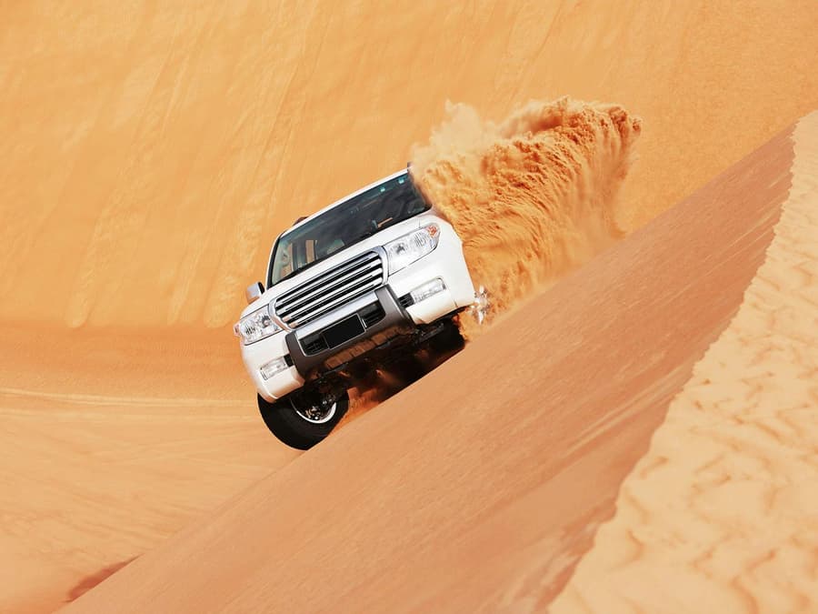 Doha Desert Safari with Camel Ride: Dune Bashing, Sandboarding & Inland Sea