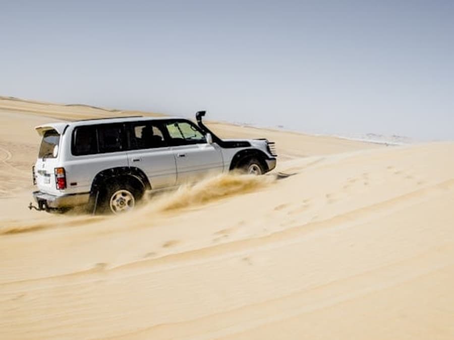 4x4 Desert Safari with Sandboarding & Camel Ride from Cairo or Giza