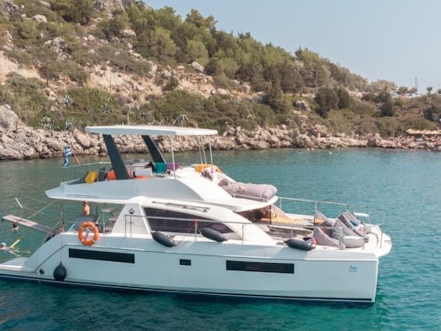 Rhodes: Power Catamaran Day Cruise with Lunch