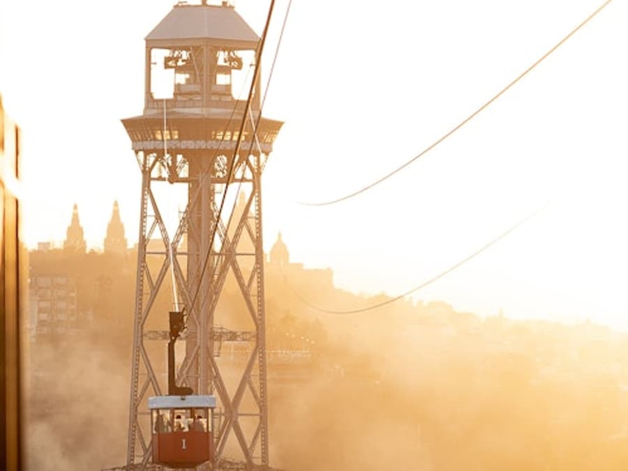 Barcelona: Guided E-bike Tour + Cable Car Ride + Sailing Experience