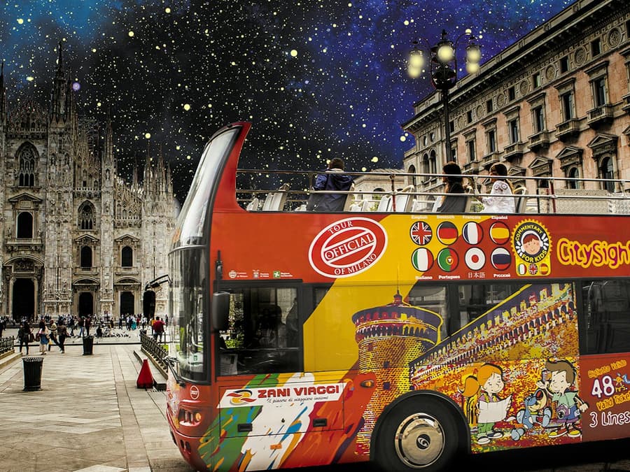 Milan: Open-Top Bus Night Tour + Audio Guide