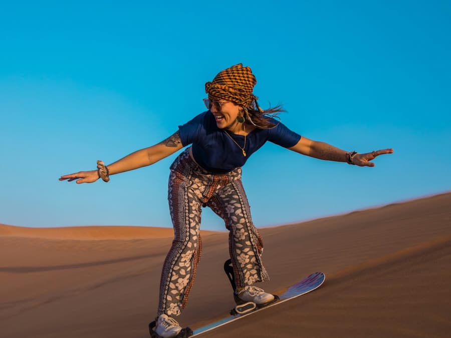 Dubai Desert Safari: Camel Ride, Sandboarding, BBQ Dinner & Quad Ride