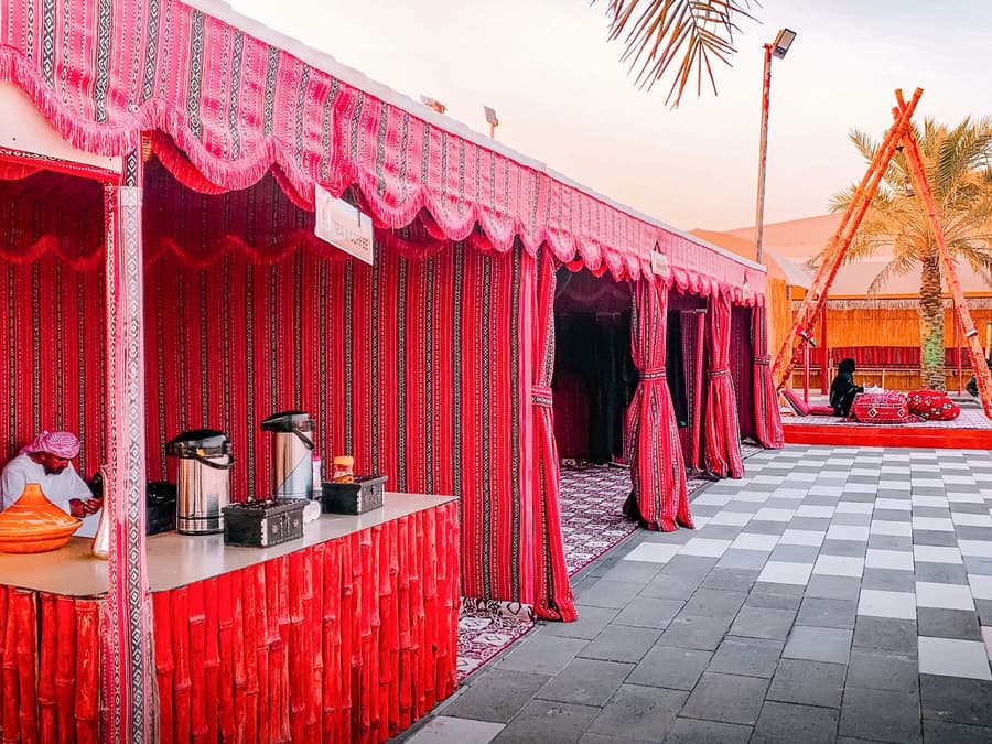 Abu Dhabi Evening Desert Safari with 4x4 Dune Bashing, Camel Ride, & BBQ Dinner 