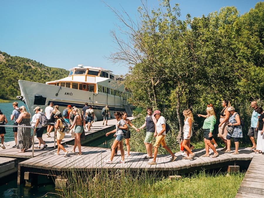 From Split: Full-Day Guided Trip to Krka National Park with Boat Ride & Wine Tasting