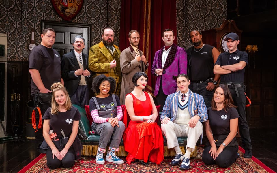 The cast of The Play That Goes Wrong on the country-house set at New World Stages