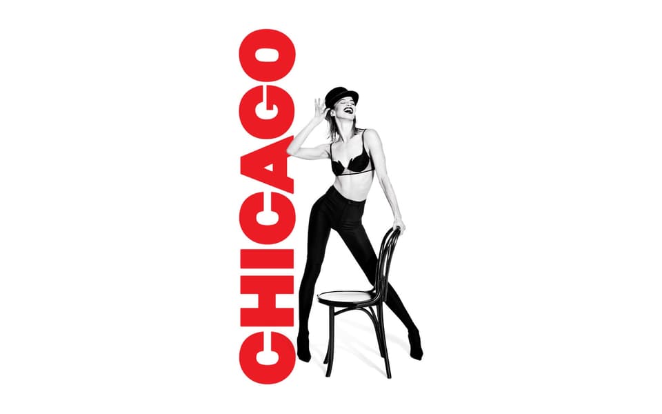 The sharp-suited staging of a Broadway musical under theatre lights