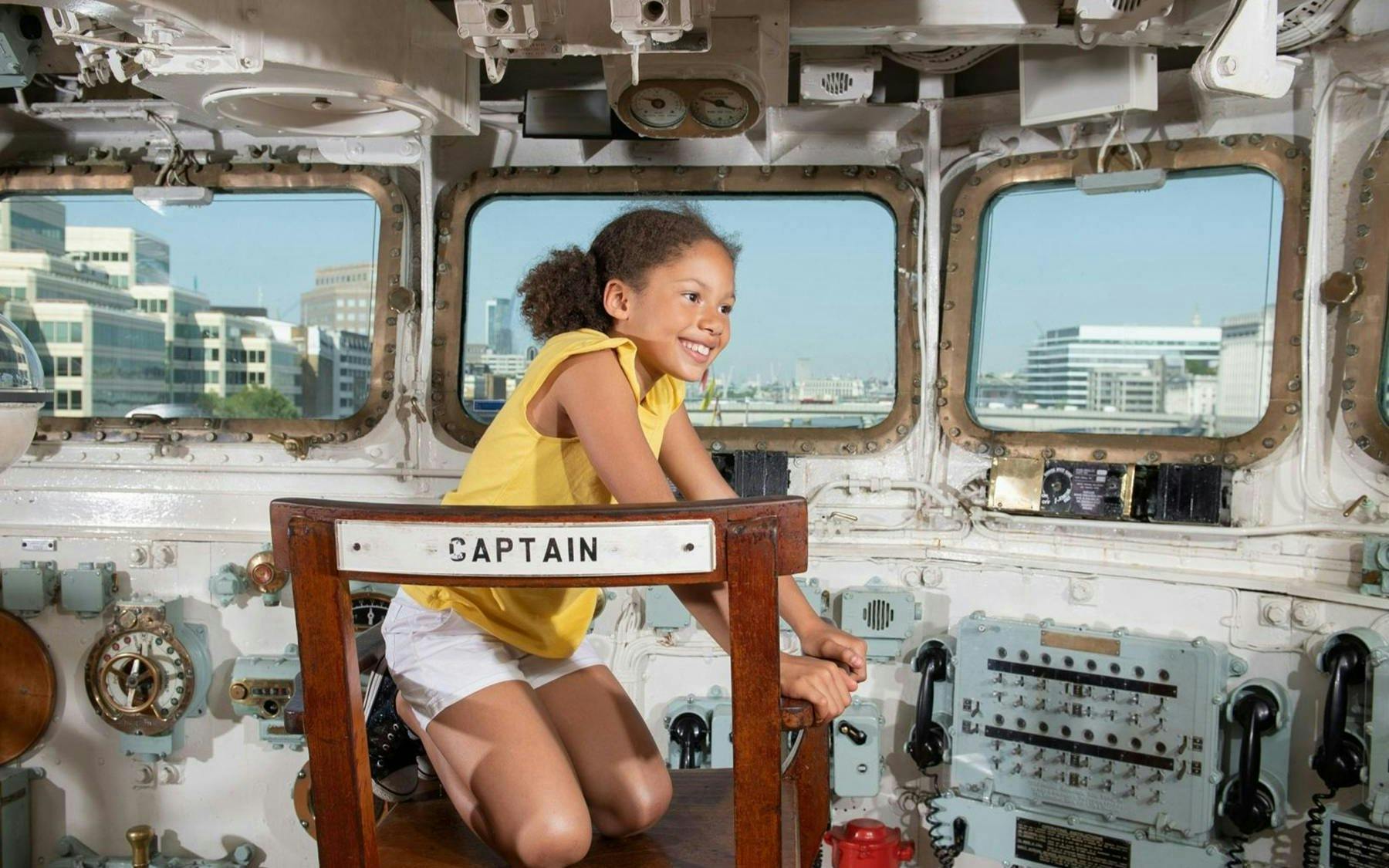 Visitors on the bridge of HMS Belfast