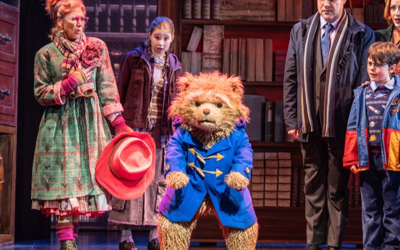 Paddington with the Brown family in Paddington The Musical, in the London production