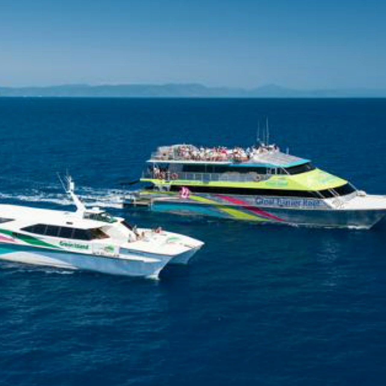 Green Island: 40-Min Guided Flight + Boat Cruise from Cairns + Lunch