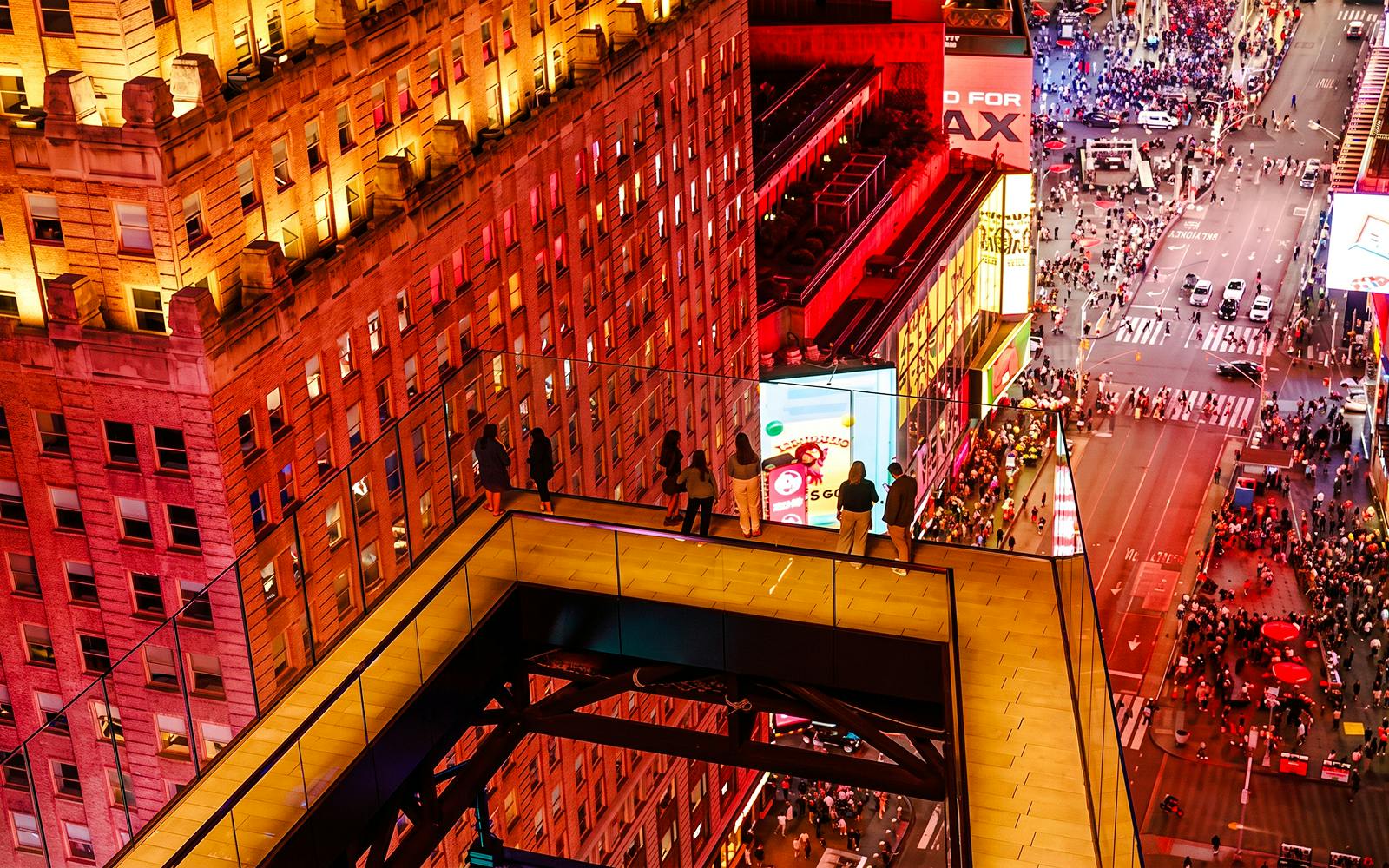 Times Square streets viewed from the glass walkway at One Times Square