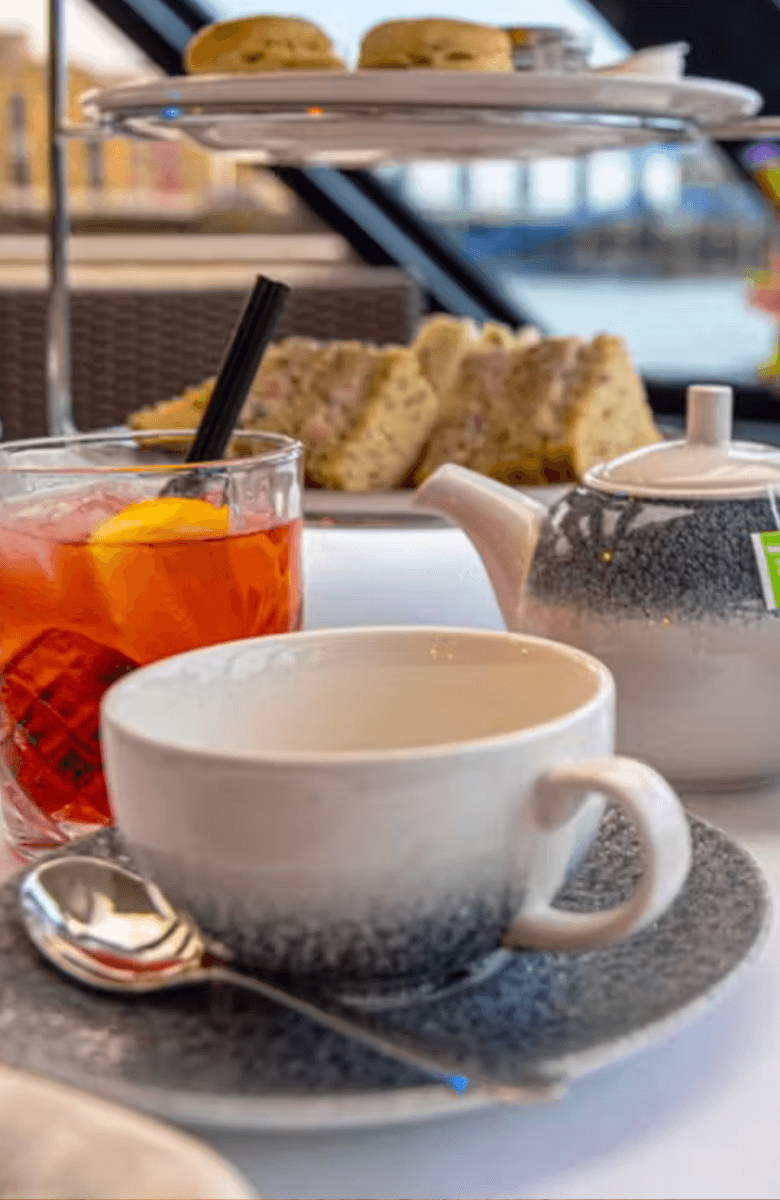 Thames River Afternoon Cruise with British Tea & Scones — portrait