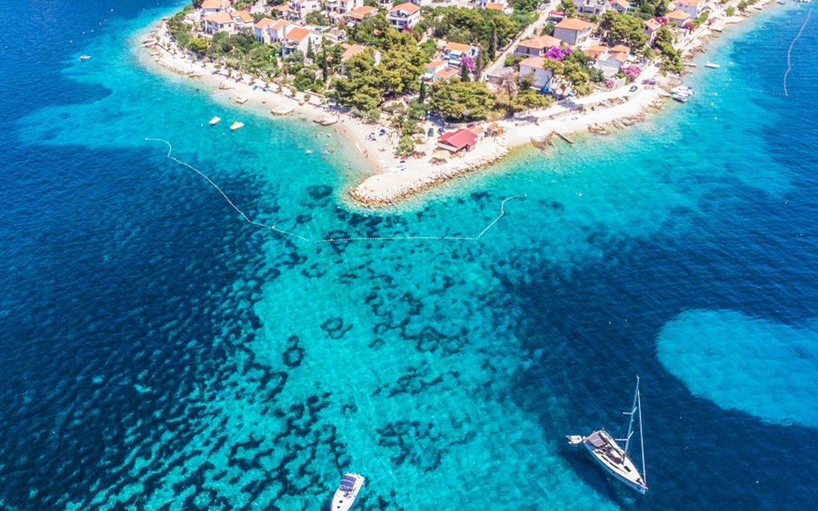 From Split: Blue Lagoon, Duga Bay & Trogir Boat Tour with Snorkeling