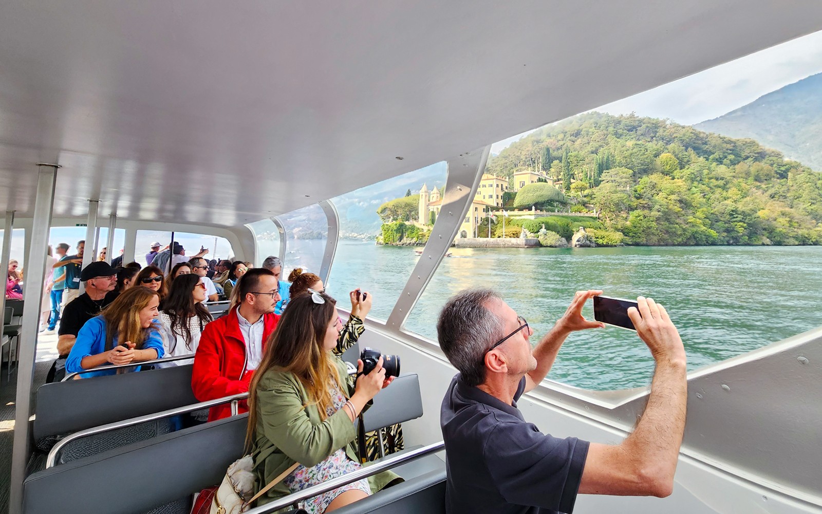 From Milan: Lake Como, Lugano & Bellagio by Bus with Private Boat Tour