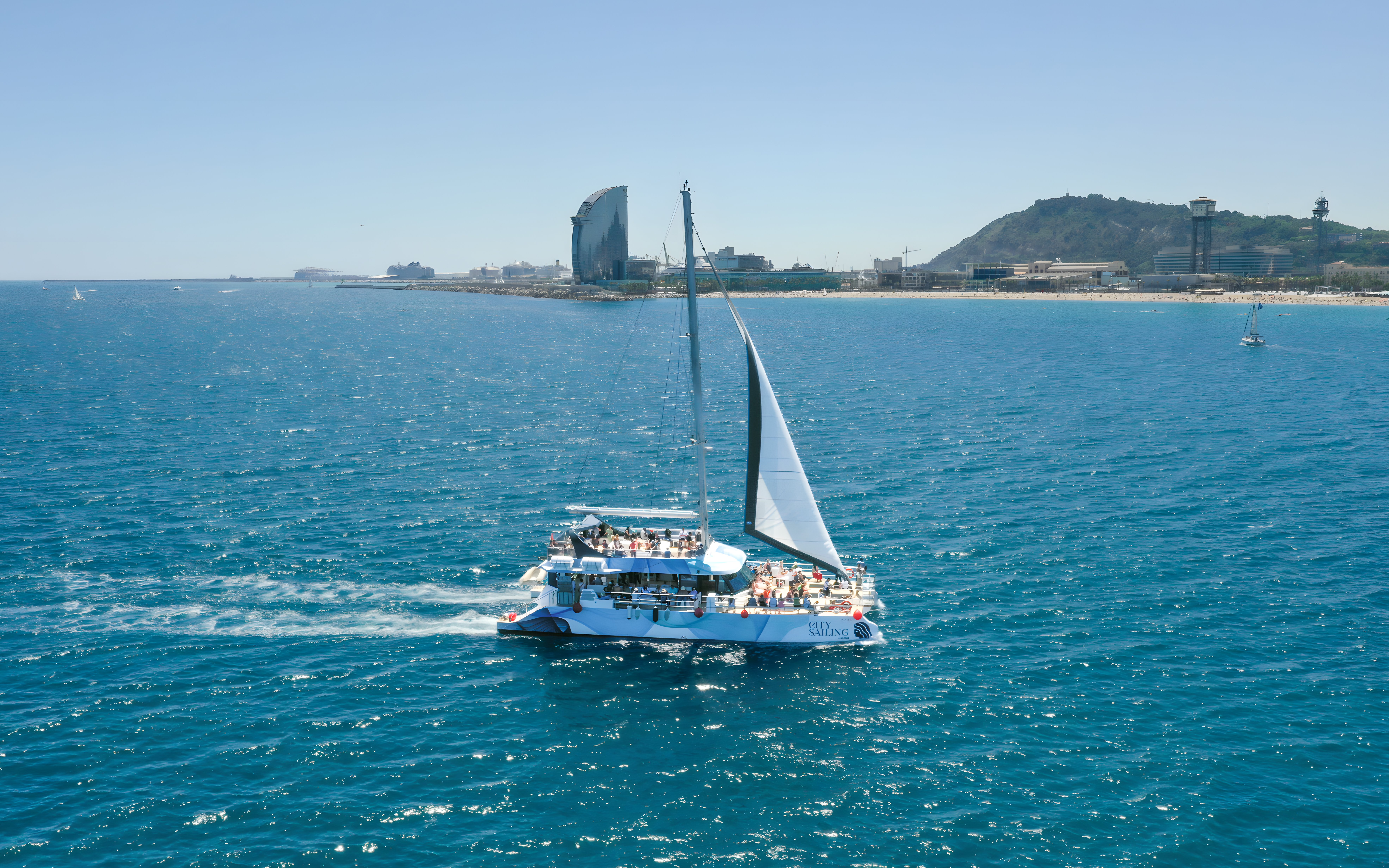Barcelona City Tour: Hop-on Hop-off Bus Tour with Eco Catamaran Cruise