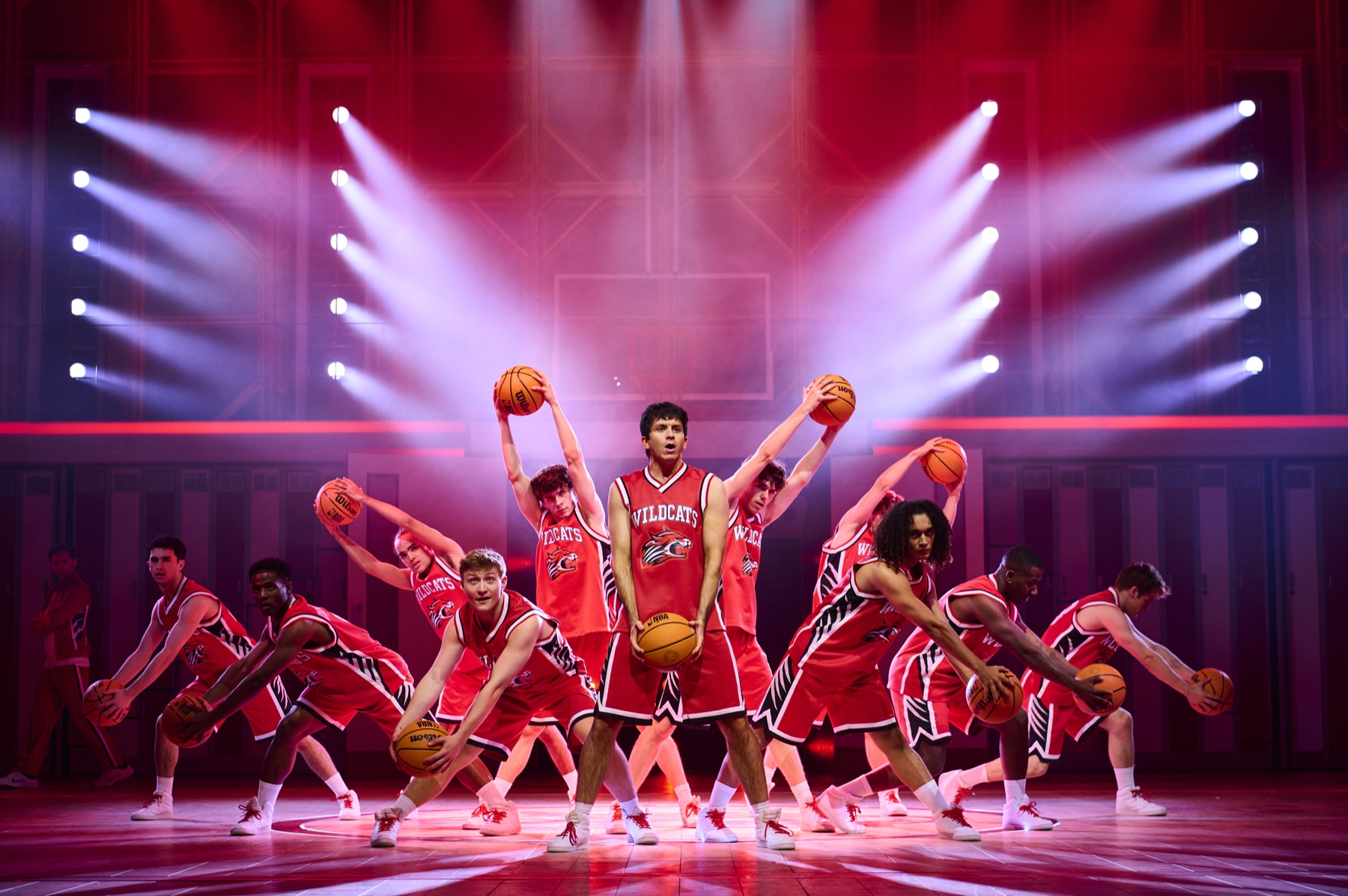 Tobias Turley as Troy Bolton and the company in High School Musical (photo: Matt Crockett)
