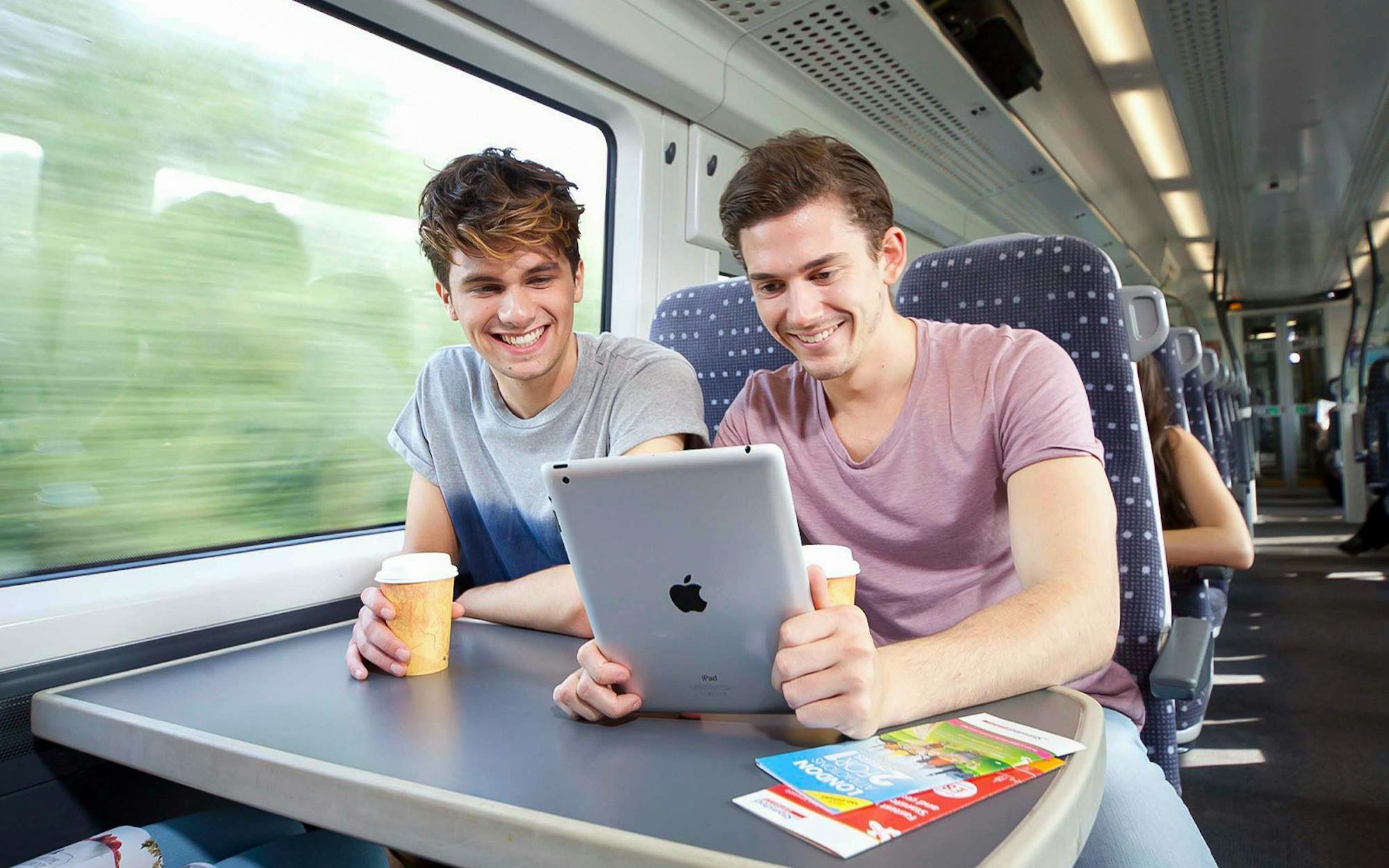 Passengers using Wi-Fi onboard the Stansted Express